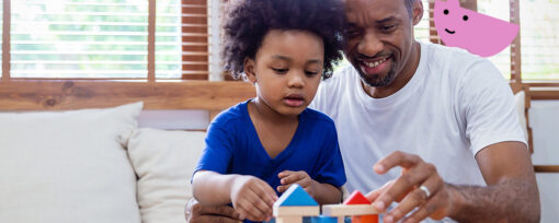 A black man and his son playing with building blocks, with a pink Speech and Language UK character in the background. The son has curly dark hair and wear a blue t-shirt. The father has a buzzcut and wears a white t-shirt. The character is shaped like a pink semi-circle and sits on the right, appearing to be on the fathers shoulder.